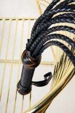 Cat-o-nine tails en cuir tressé AU RAPPORT